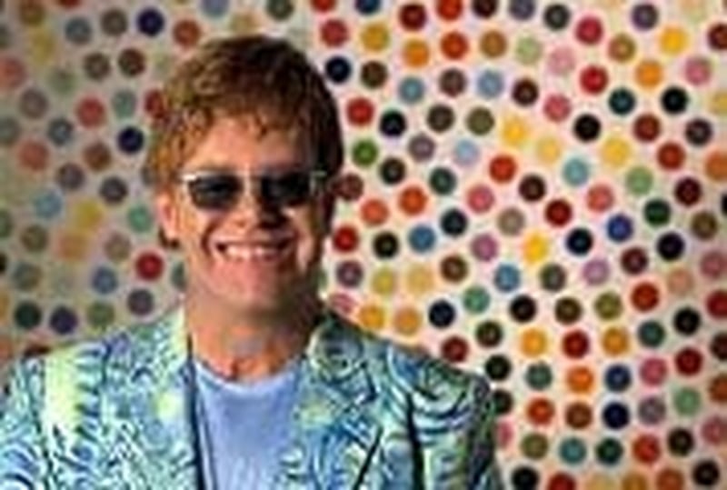 John - Describes Live 8 London concert as "charisma-free"