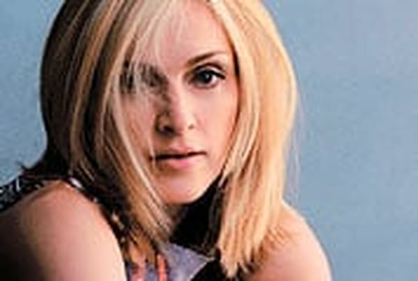 Madonna - Accused by Elton John of lip-synching