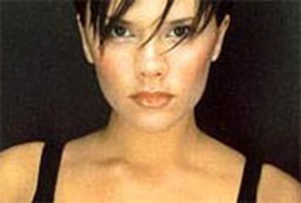 Beckham - Tells magazine that she has never read a book