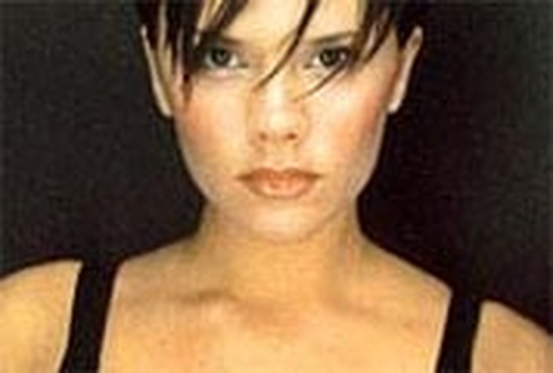 Beckham - Tells magazine that she has never read a book