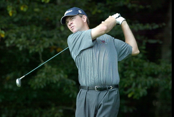 Davis Love III blamed his poor iron play for defeat at the hands of Geoff Ogilvy