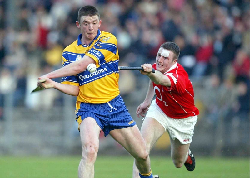 Clare's Diarmuid McMahon and Mark Prendergast of Cork do battle
