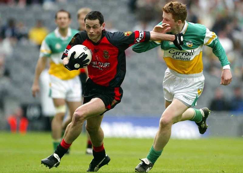 Down's John Lavery with Pascal Kellaghan of Offaly