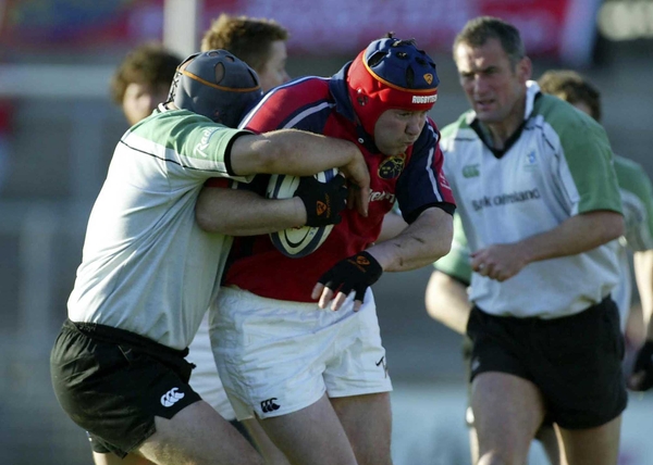 Anthony Foley is tackled by Connacht's Dan McFarlan in last night's game