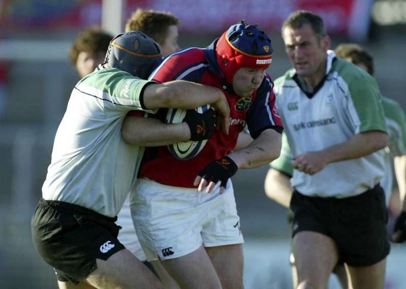 Anthony Foley is tackled by Connacht's Dan McFarlan in last night's game