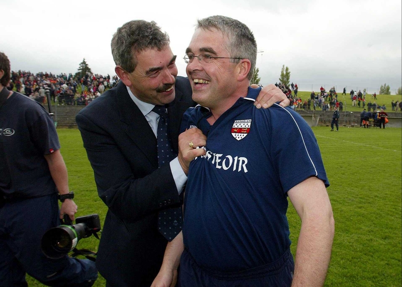 Carlow manager Luke Dempsey is congratulated following his side's win over Longford
