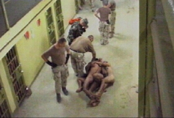 Abu Ghraib prison - Commander reduced in rank