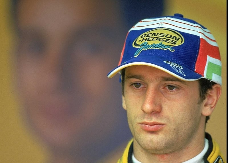 Jarno Trulli kept beat Jenson Button to pole