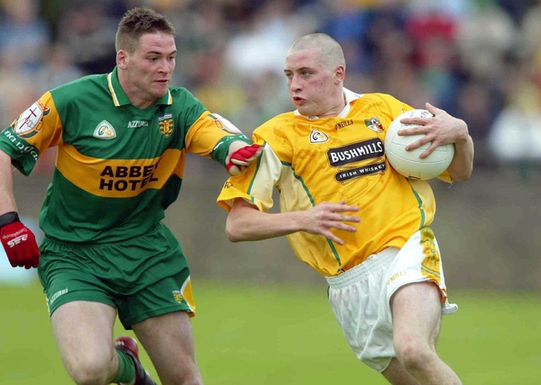 Antrim's Kevin McGourty takes on Donegal's Brendan Boyle