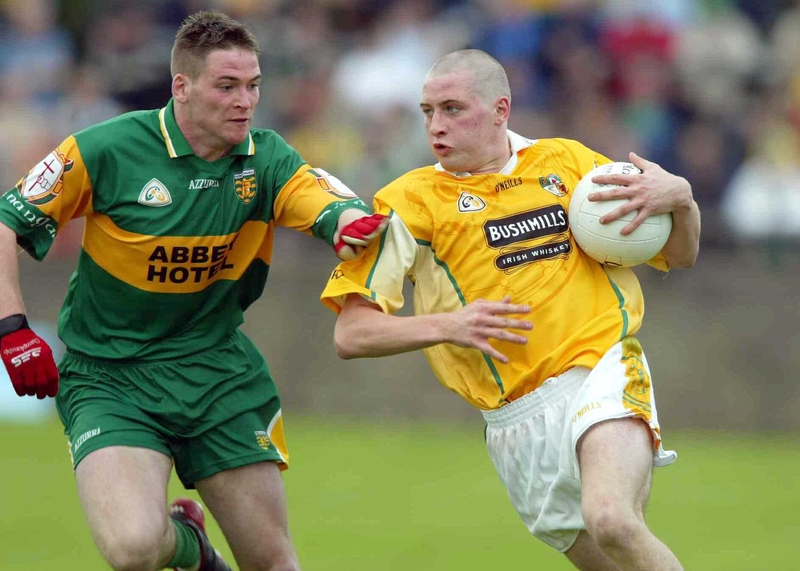 Antrim's Kevin McGourty takes on Donegal's Brendan Boyle