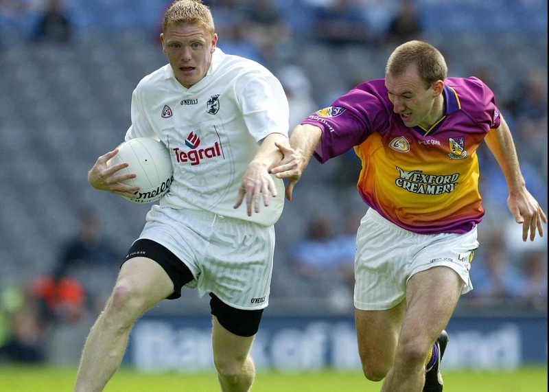 Morgan O'Sullivan of Kildare escapes Wexford's Philip Wallace