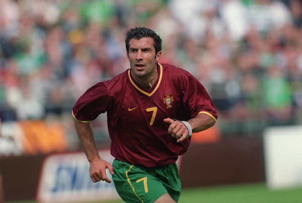 Portugal captain Luis Figo lead his team into the last 16