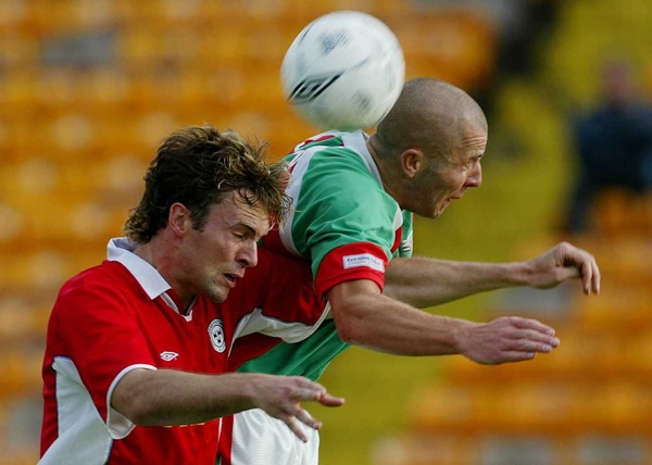 Jamie Harris, in red, has joined Dunfermline Athletic