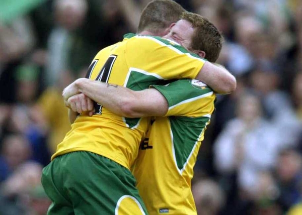 Stephen McDermott and Adrian Sweeney celebrate at the final whistle