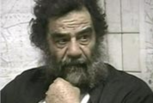Saddam Hussein - Appears before Iraqi judge
