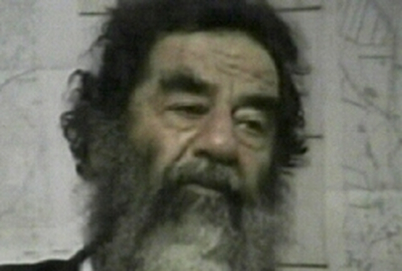 Saddam Hussein    Charged over deaths