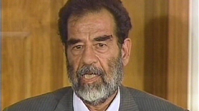 Saddam Hussein - Controversy over photos