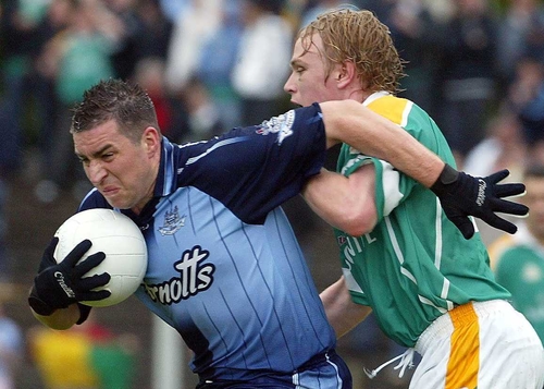 Dublin's Jonathon Magee tussles with Noel Doonan of Leitrim