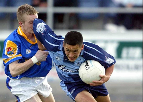 Dublin's Jason Sherlock evades Longford's Declan Reilly