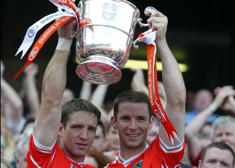 Kieran McGeeney, left, can concentrate fully on next week's clash with Australia