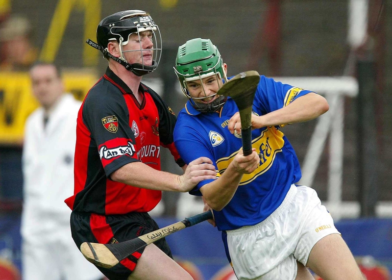 Tipp's Tony Scroope and Down's David Coffey in action today in Portlaoise