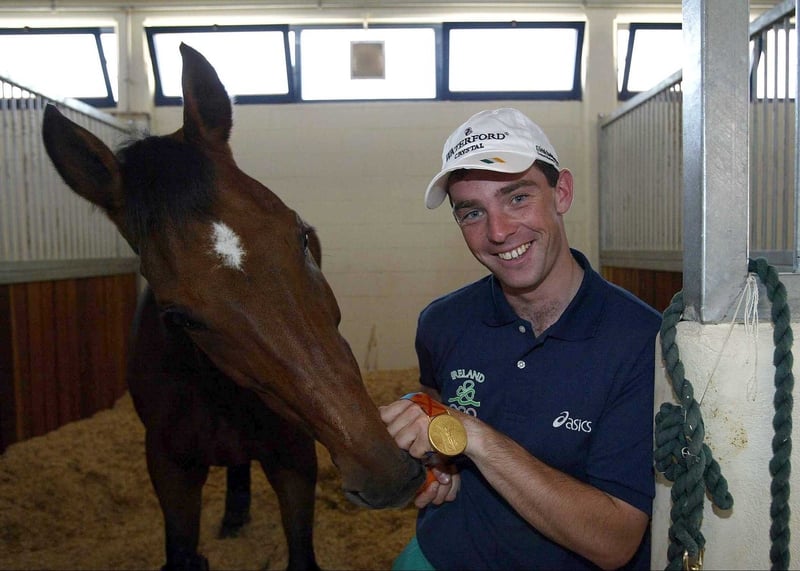 Cian O'Connor, pictured beside Waterford Crystal, proudly displays his Olympic gold medal