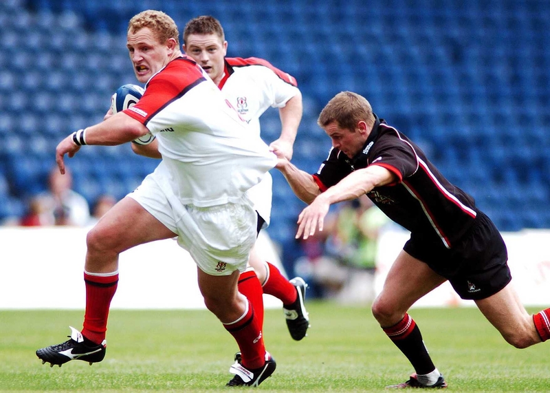 Campbell Feather is tackled by Chris Paterson during Ulster's Celtic League clash against Edinburgh in September