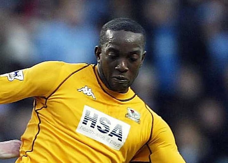 Dwight Yorke has pressed charges against two men who racially abused him during a game