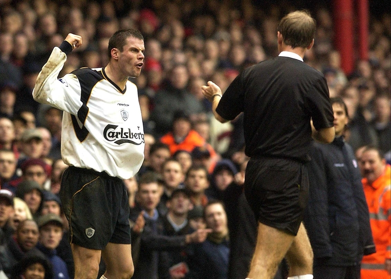 Jamie Carragher pleads his case with Mike Riley having been sent off in the FA Cup, 2002