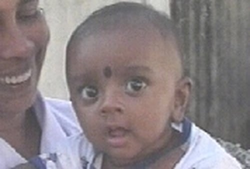 'Baby 81' - Reunited with his parents