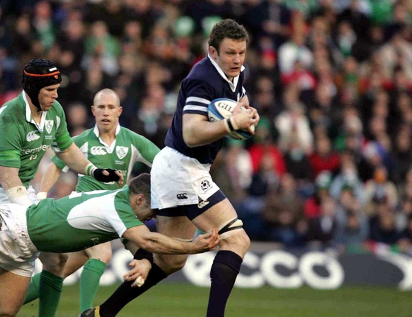 Jason White is tackled during Scotland's recent Six Nations defeat against Ireland