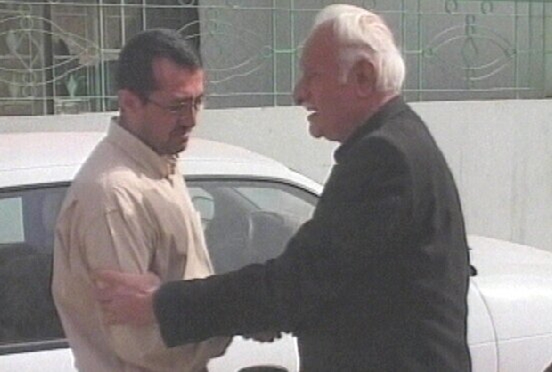 Iraq - Judge's relatives console each other