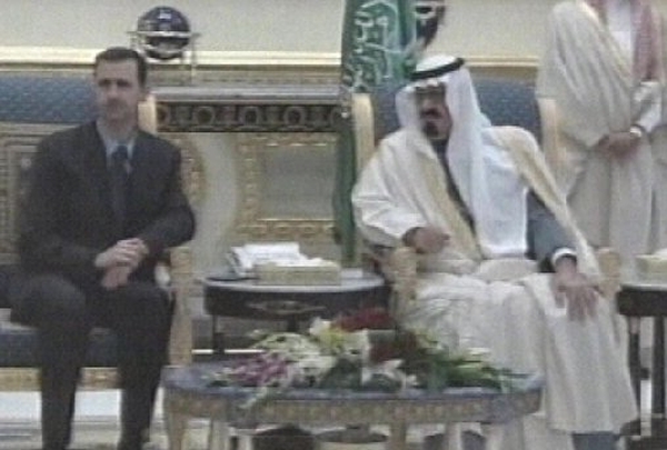 Bashar al-Assad (left) - Set to announce pullout