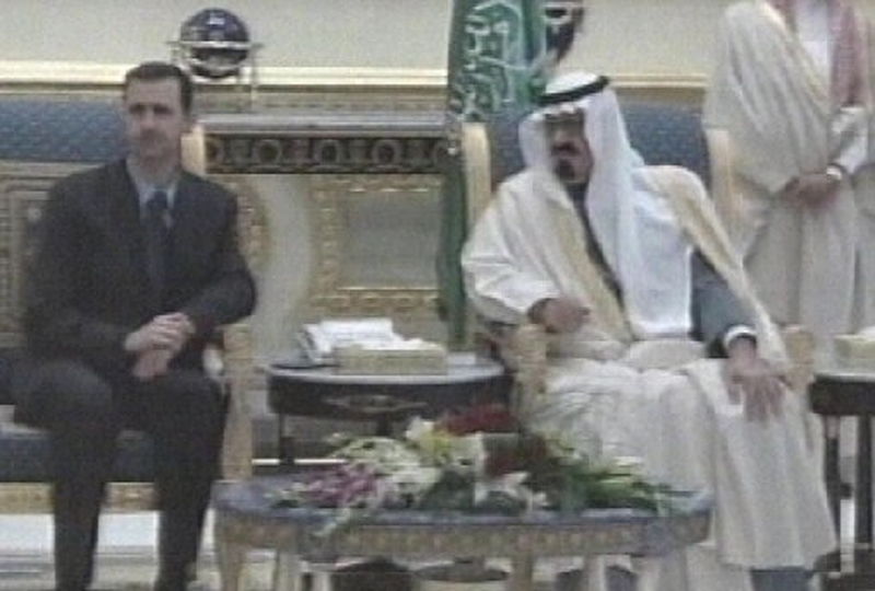 Bashar al-Assad (left) - Set to announce pullout