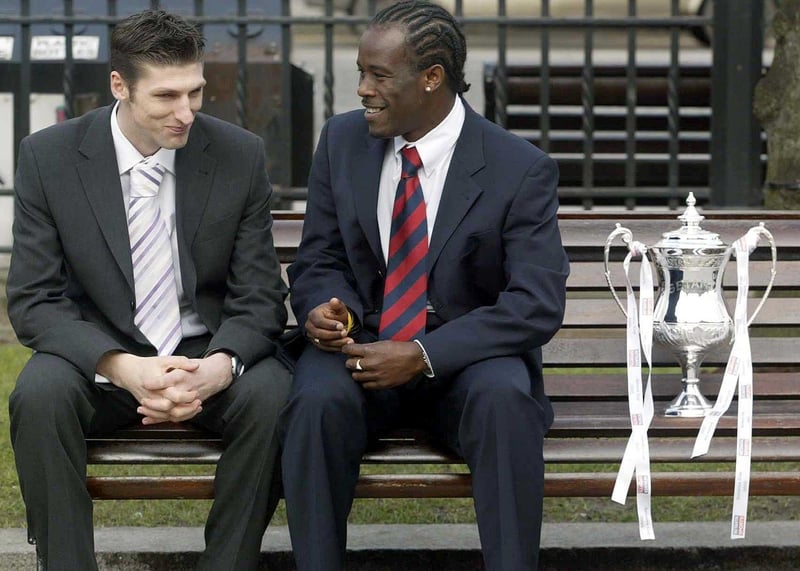Paul Leeman of Glentoran (l) and Longford's Eric Lavine pictured with the new Setanta Cup trophy