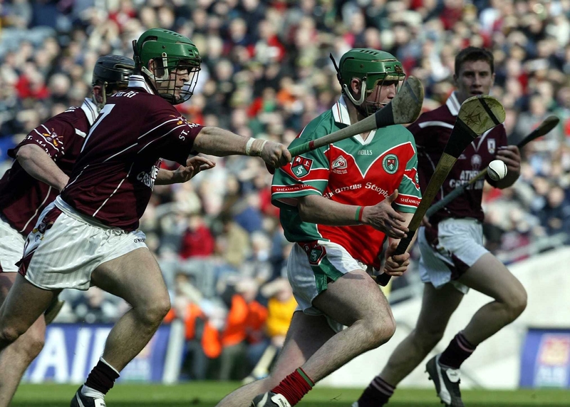 Eoin Larkin evades Shane Donoghue of Athenry on his way to inspiring James Stephens to victory today