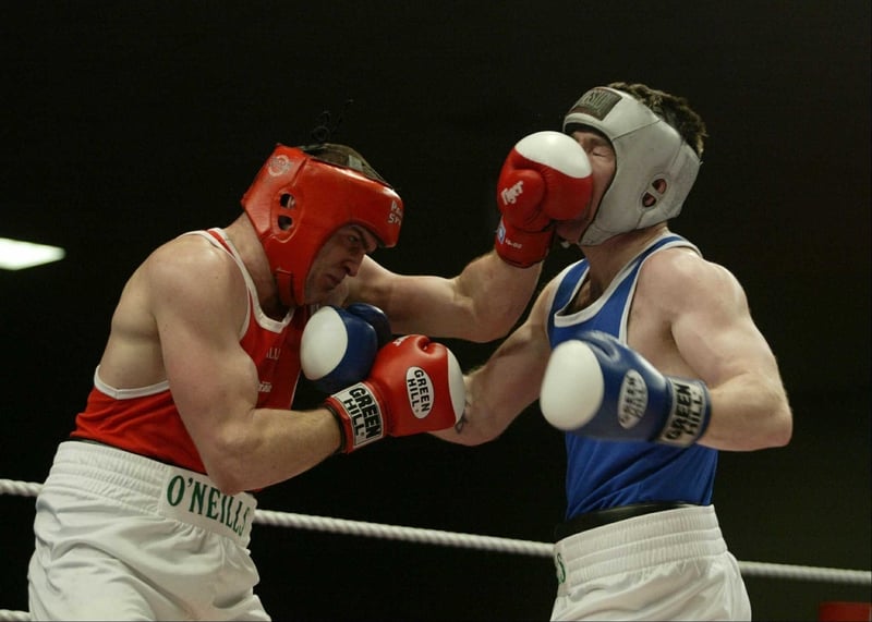 Ian Tims (blue) in action against Alan Reynolds (Red) in the National Stadium last night