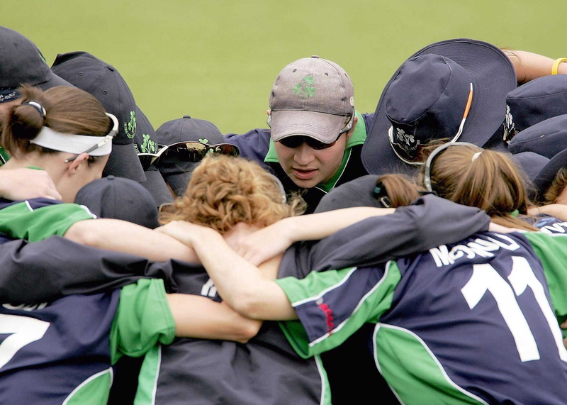 Ireland's women huddle before their abandoned match against South Africa today