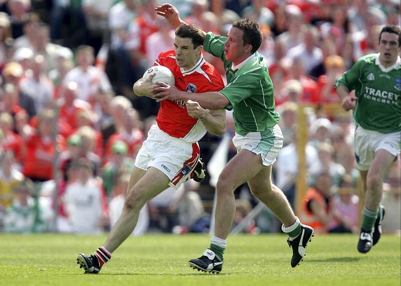 Armagh's Paul McGrane is tackled by Fermanagh's Shane McDermott at St Tiernach's Park