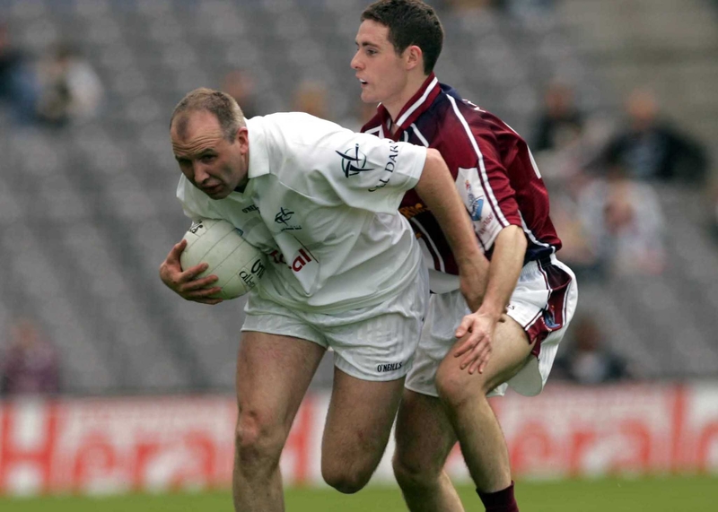 Glenn Ryan, one of the heroes for Kildare, tussles with Westmeath's Fergal Wilson