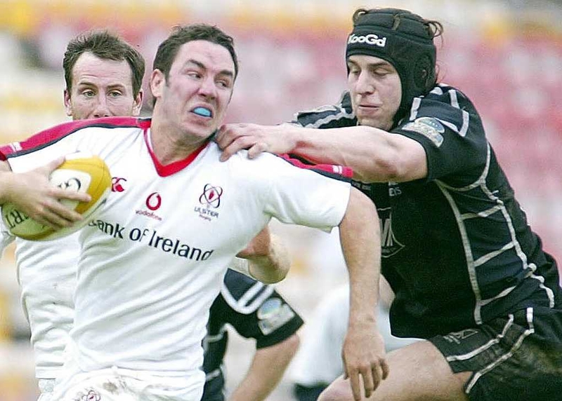Ryan Jones tackles Ulster's Paddy Wallace during the Celtic Cup quarter final