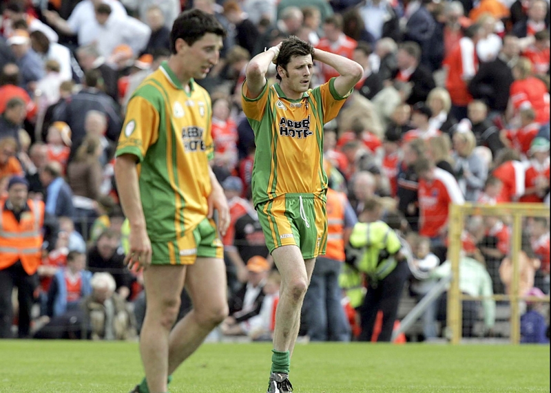 Christy Toye - far right - shows his dejection after his missed the kick that would have seen Donegal grab victory