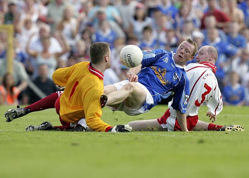 Pascal McConnell bravely challenges Jason O'Reilly, the Tyrone 'keeper, suffering a sternum injury in the process.