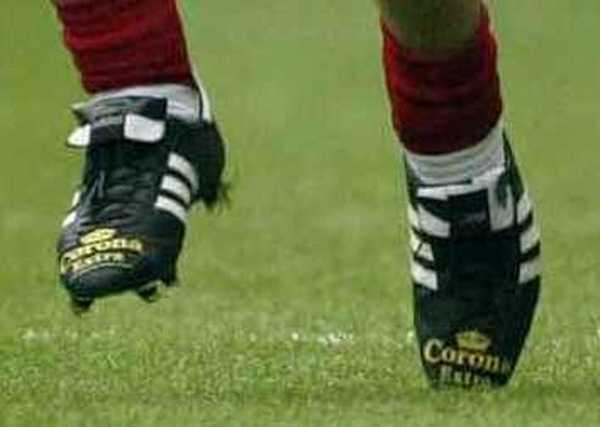 The boots of Cork hurler Niall McCarthy, bedecked with the offending advertisement