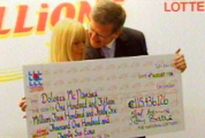 She's a winner! - Dolores McNamara with her cheque