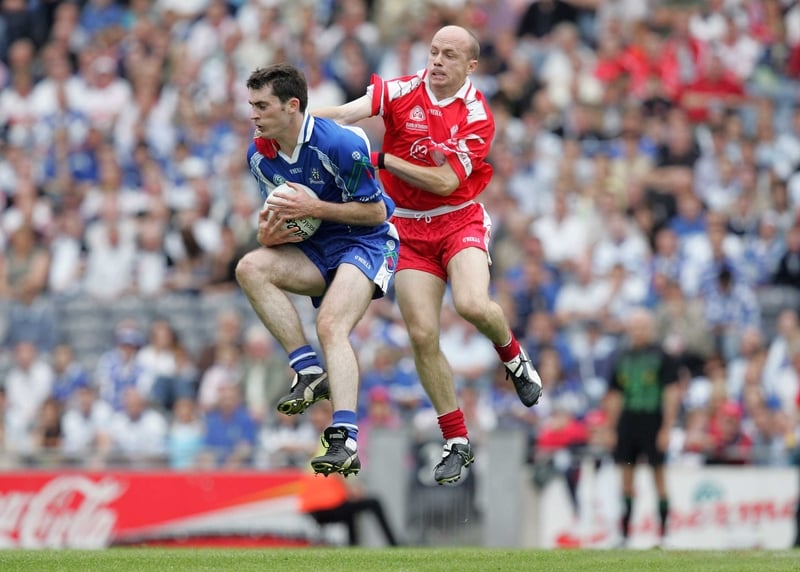 Peter Canavan of Tyrone and Monaghan's Colm Flanagan vie for possession in today's match