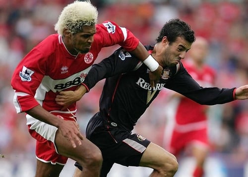 Julio Arca goes past former Middlesbrough player Abel Xavier