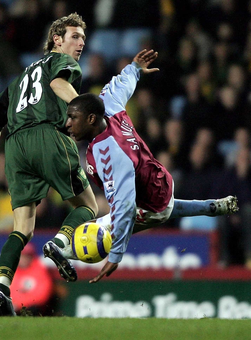 Aston Villa's Jlloyd Samuel has been told that, under FIFA regulations, he cannot represent Trinidad and Tobago