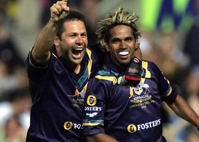 Chris Johnson (left) celebrates a goal during the second test with Andrew Lovett