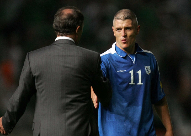 Graham Kavanagh and Brian Kerr shake hands after the disappointing draw with Israel